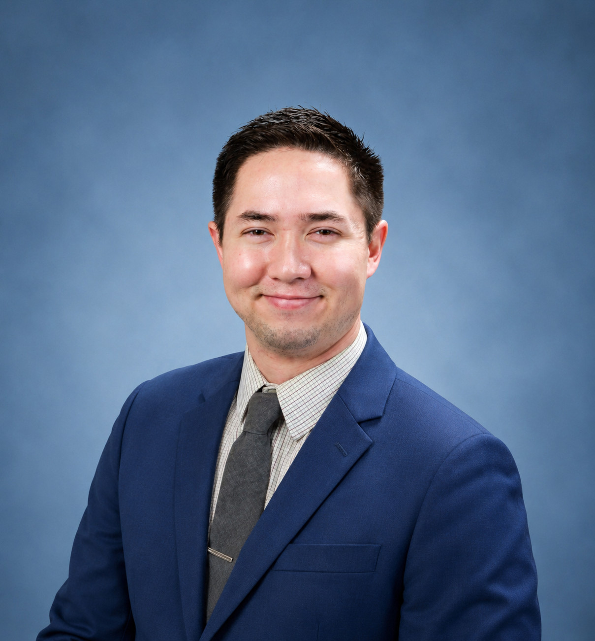Chet Matsuura Professional Headshot (Blue Background)